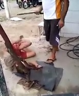 Dude Tortures Thieves on the Sidewalk as Crowd Watches