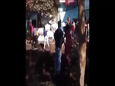 Mob of People Beat a Guy