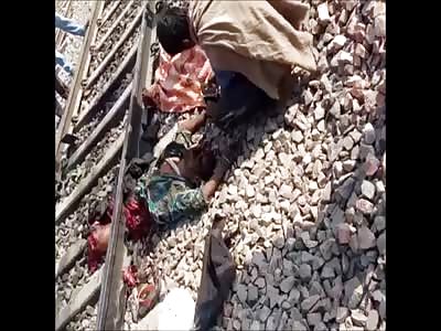 Suicidal Man with Severed Head on Train Tracks 