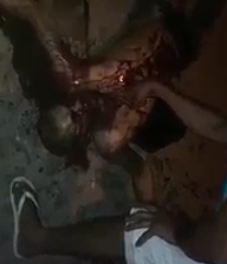 Men keeps pointing the bullet holes while dude drowns in his own blood