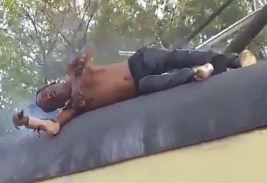 Man Fries in Agony on Top of Train