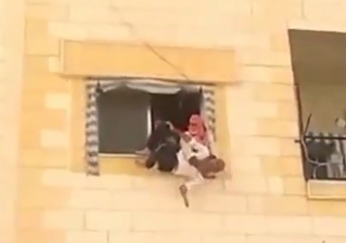 Old man fights and manage to fall from his apartment