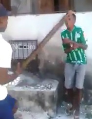 Two Thieves Being Brutally Punished by Slum King