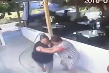 CCTV: Car Crashes Through Outside Bar 