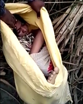 WTF:Woman Found in a Bag in Full Rigor Brought to Crowd that Slaps Her