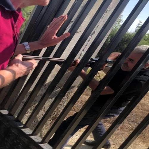 Live Murder... Argument Leads to Guy Murdering Another Through a Gate