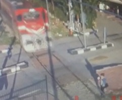 Oblivious Girl Doesn't Stop Far Enough Back From Train.. BOOM