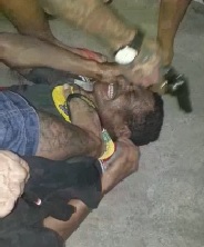 Thugs Make Short Work of Caught Thief.