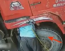 Tire Explodes Right as Mechanic if Trying to Fix Something