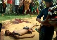 Bringing the Kids out To See the Beheaded Man