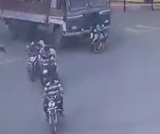 Truck Swallows Biker 