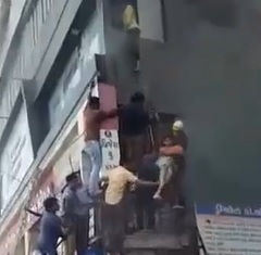 (Better Angles) Students Escape Thick Smoke, 20 Dead