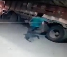 Dude Commits Suicide by Truck Wheel