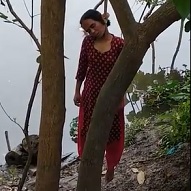 Lady in Red Hanging in the Woods