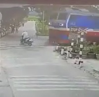 Scooter Girl vs. Train