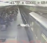 Masked Man Calmly Jumps in Front of Train