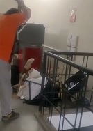 Woman Beaten with Sticks 