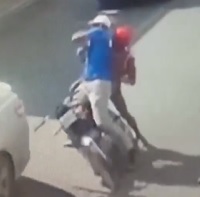 Thug Attempts to Steal a Bike While Guy is Driving (Shot by Cops)