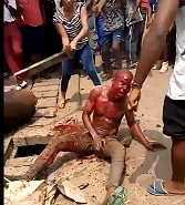 Huge Crowd Beats Dude to Death