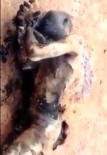 Crispy Dude Still Smoking in Agony From Mob Lynching.