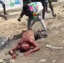 Corrupt Cop All Sorts of Broken and Sliced up in Mob Justice Attack.