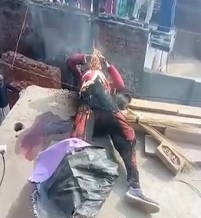 Minimum Wage Worker BBQ'd on Roof (Crowd Watches)