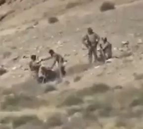 Landmine Disintegrates Two Dudes (Body Parts Fly Everywhere)