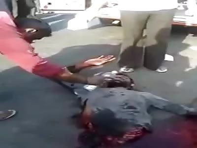 Graphic accident : Man cut in two dying keeps moving (NEW ANGLE)