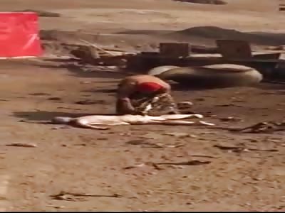 Slicing the body to give it to the vultures