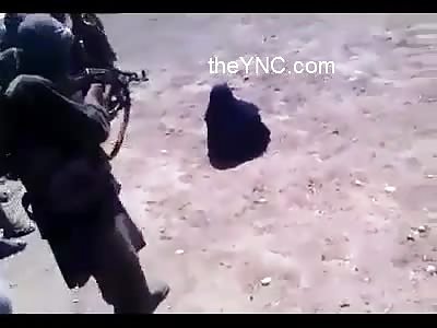 Taliban public execution of Afghan woman with AK-47 