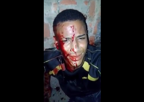 Thief Caught In A Favela Hit With A Stick