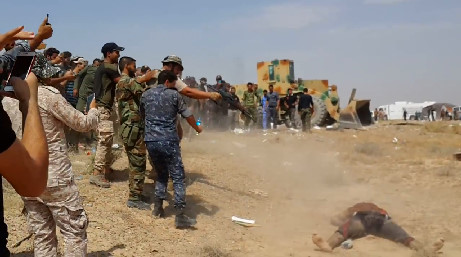 Scum Daesh Leader Killed by Iraqi Army is Burned and Shot Many Times