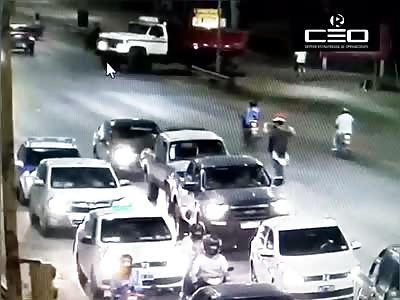 Motorcyclist hit by truck