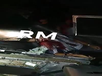 Car impact with parked truck