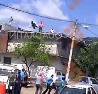 DESPERATE THIEF JUMPS FROM BUILDING TO ESCAPE