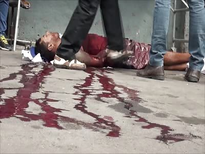 BUTCHERED IN THE STREET