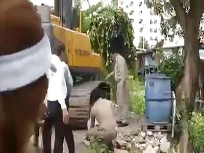 TRUCK RUNS OVER MAYOR LEGS DURING GROUP PHOTO