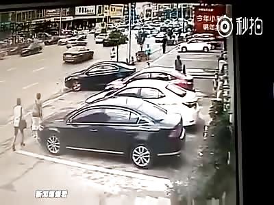 TWO WOMAN HIT AGAINST WALL BY REVERSING CAR