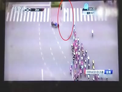 PEDESTRIAN CAUSES HUGE CRASH DURING BICYCLE RACE