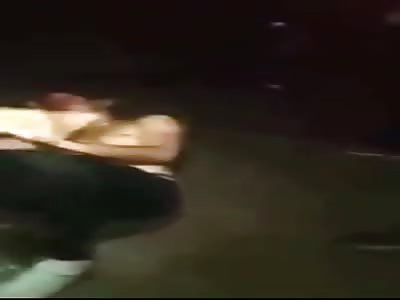 HALF-NAKED THIEF BEATEN BY MOB