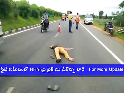 TRUCK CRUSHED BIKER HEAD