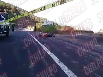 THREE TIED AND TORTURED CORPSES FOUND ON THE ROAD