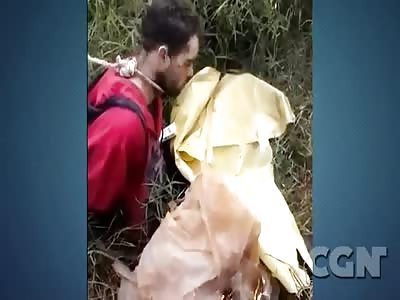 THIEF BEING BEATEN AND THREATENED WITH FIRE