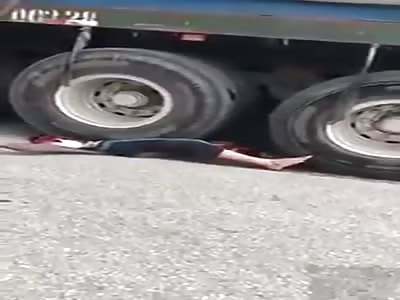 CYCLIST SMASHED BY TRUCK, DESTROYED HEAD