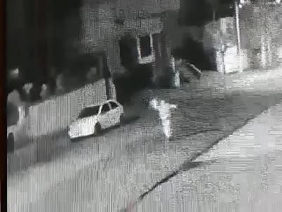 COP IS RUN OVER BY CAR