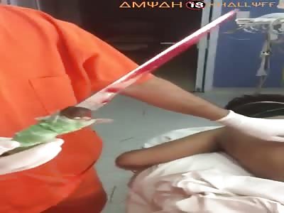 MAN WITH HUGE DAGGER STUCK IN THE BACK