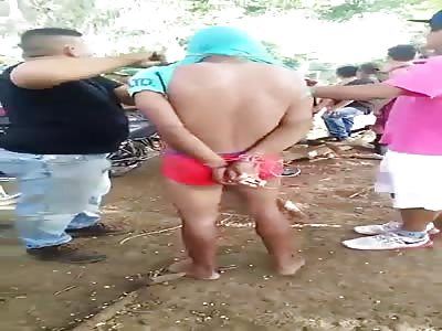 THIEF IS TIED AND BEATEN