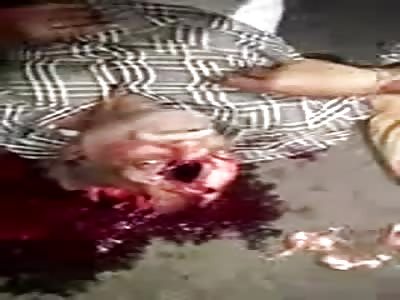 BODY WITH DESTROYED HEAD