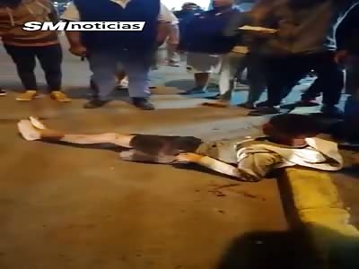 KIDNAPPER IS BEATEN BY MOB