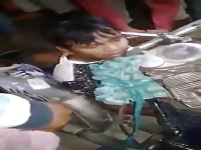 NECK TRAPPED IN MOTORCYCLE WRECKAGE